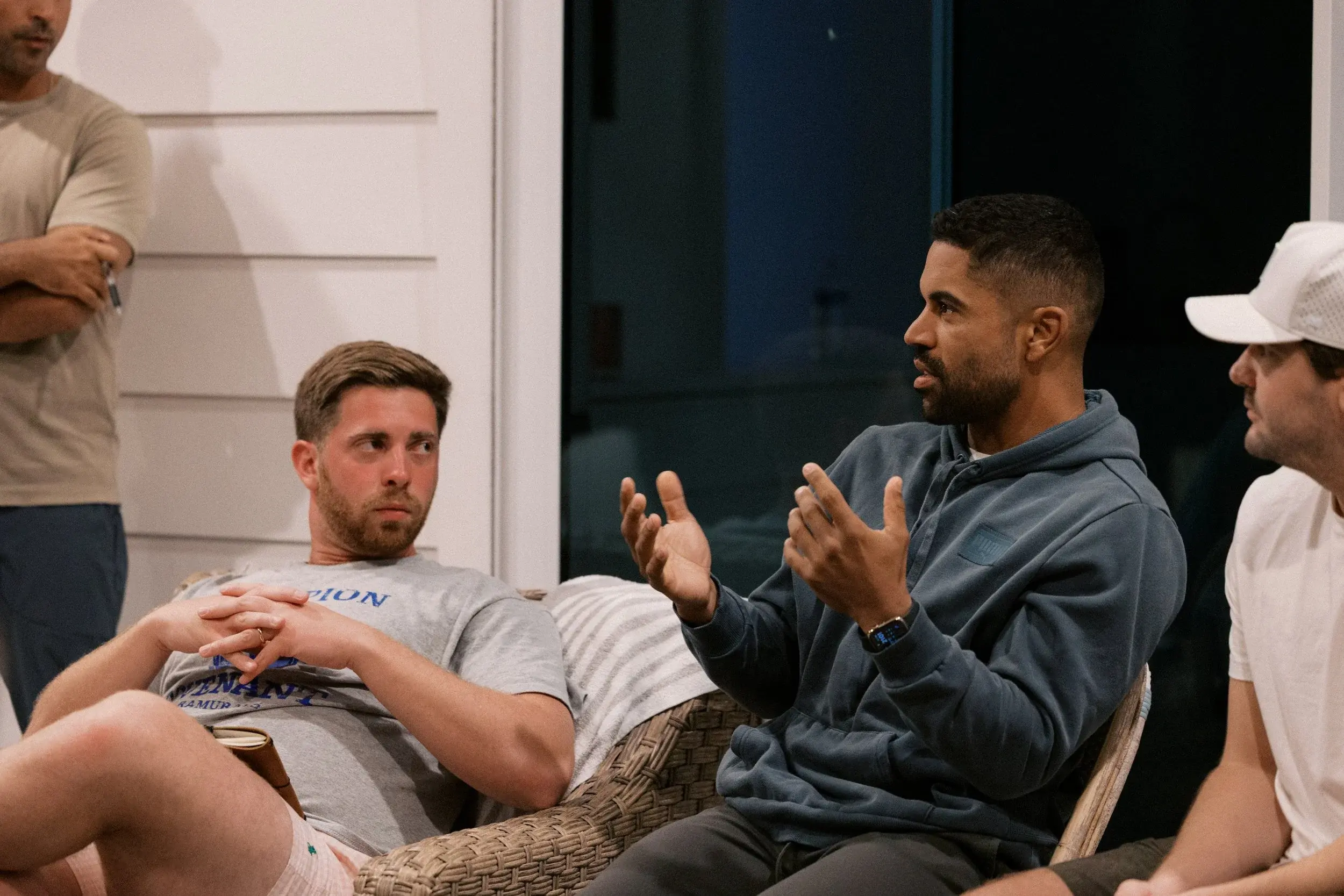 Two members talking during an evening session